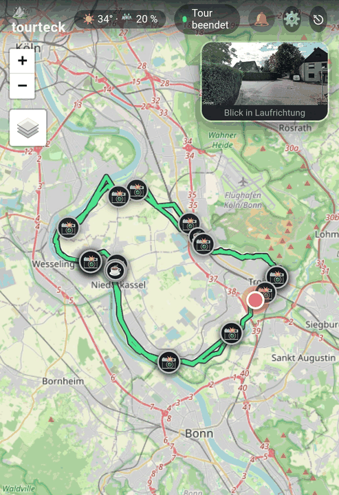 Tracking-App Tourteck zeigt die beendete Tour als grüne Route entlang des Rheins zwischen Köln, Wesseling, Niederkassel und Troisdorf.